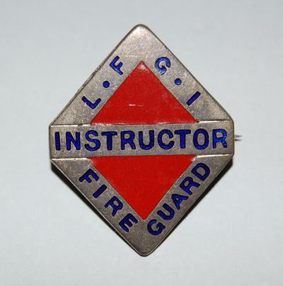 Local Fire Guard Instructors (LFGI) silver-coloured, locally-trained badge.