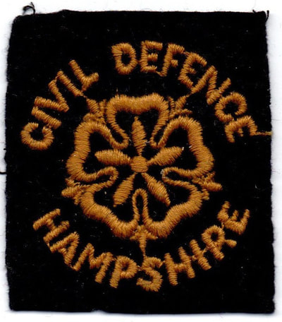 Badge sewn to epaulettes of Civil Defence services in Hampshire.